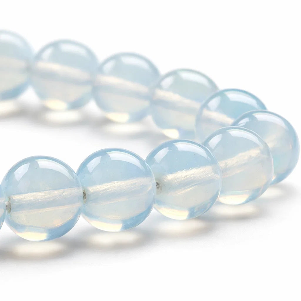 Natural opalite crystal bracelet in a close white-background bead view