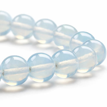 Natural opalite crystal bracelet in a close white-background bead view