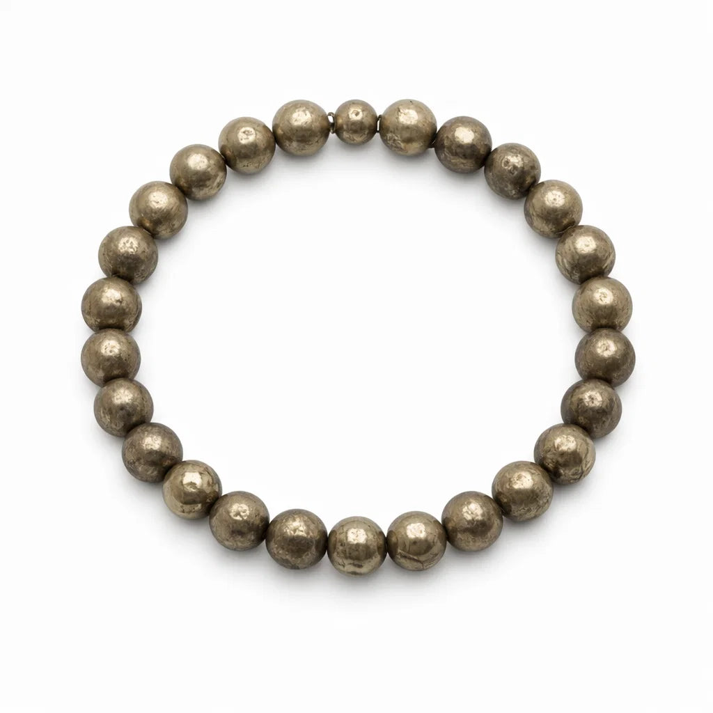 Natural pyrite bracelet showing the bead colour and surface on white