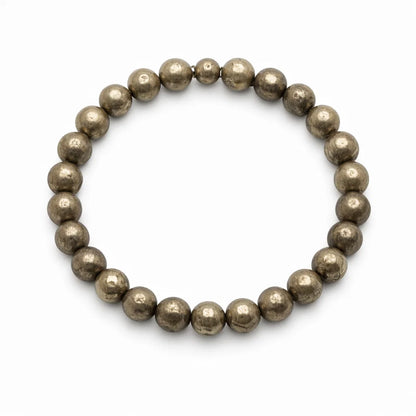 Natural pyrite bracelet showing the bead colour and surface on white