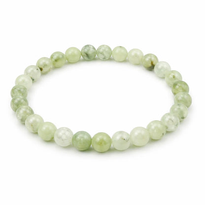 Natural prehnite crystal bracelet showing the bead colour and surface on white