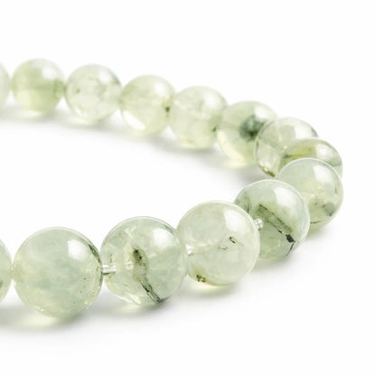 Natural prehnite crystal bracelet in a close white-background bead view