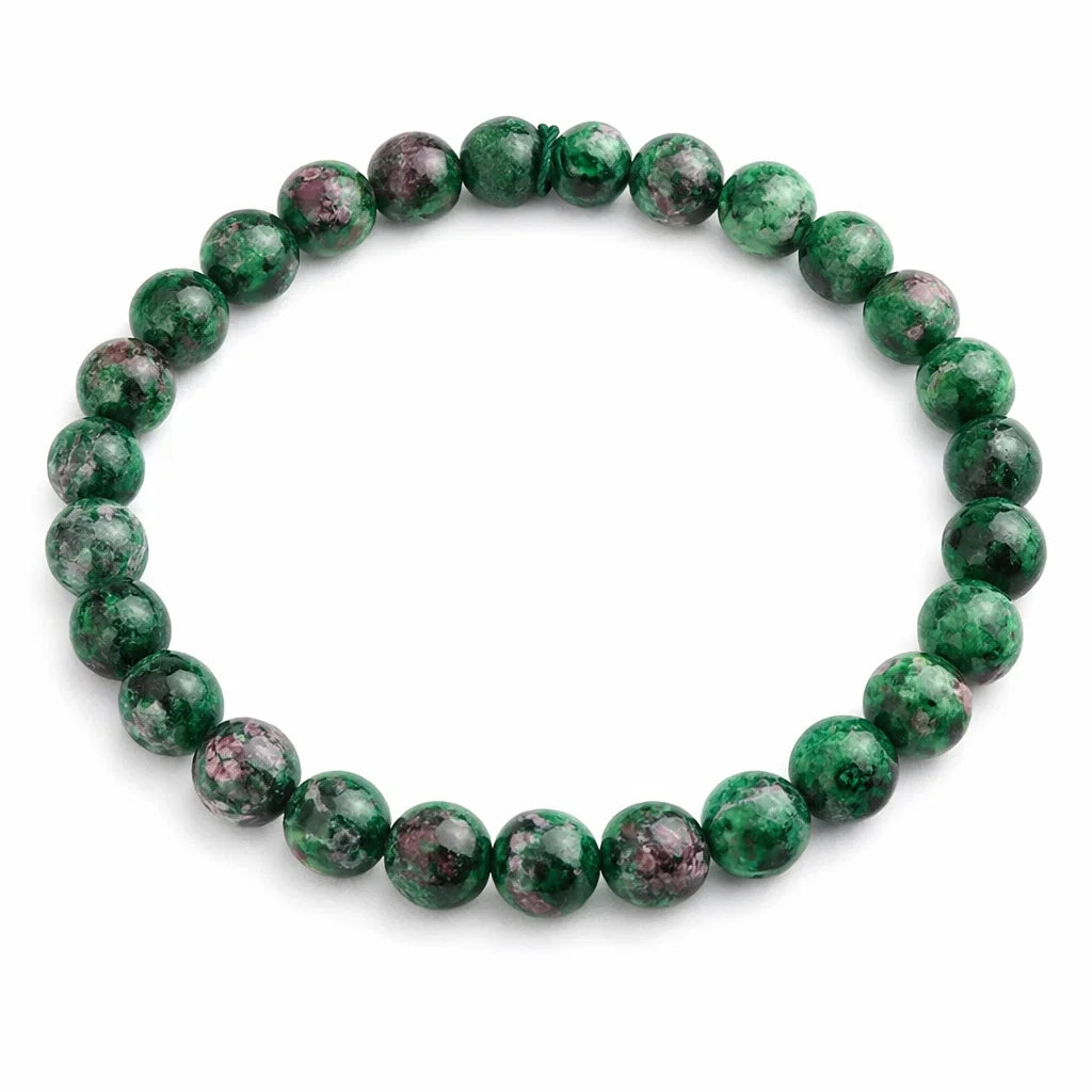 Natural ruby zoisite crystal bracelet showing the bead colour and surface on white