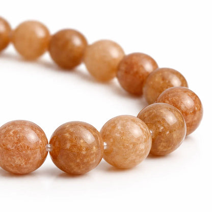 Sunstone crystal bracelet shown in a full circular view on a white background