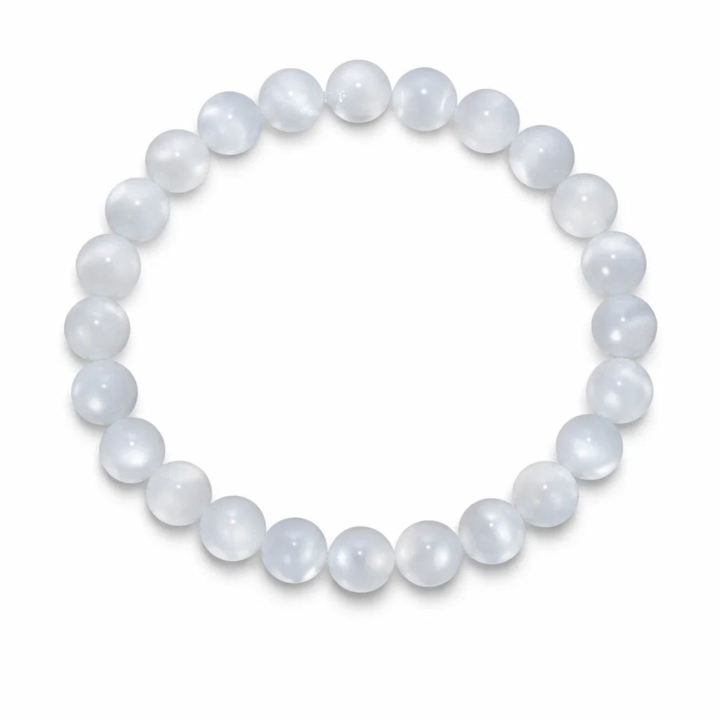 Natural selenite crystal bracelet showing the bead colour and surface on white