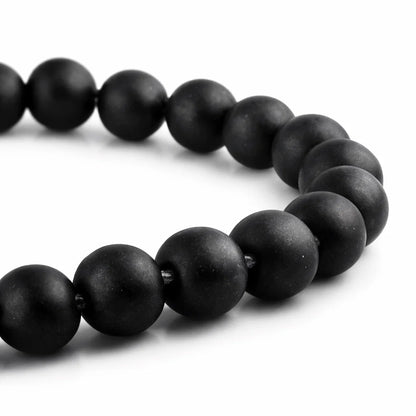 Natural shaligram crystal bracelet in a close white-background bead view