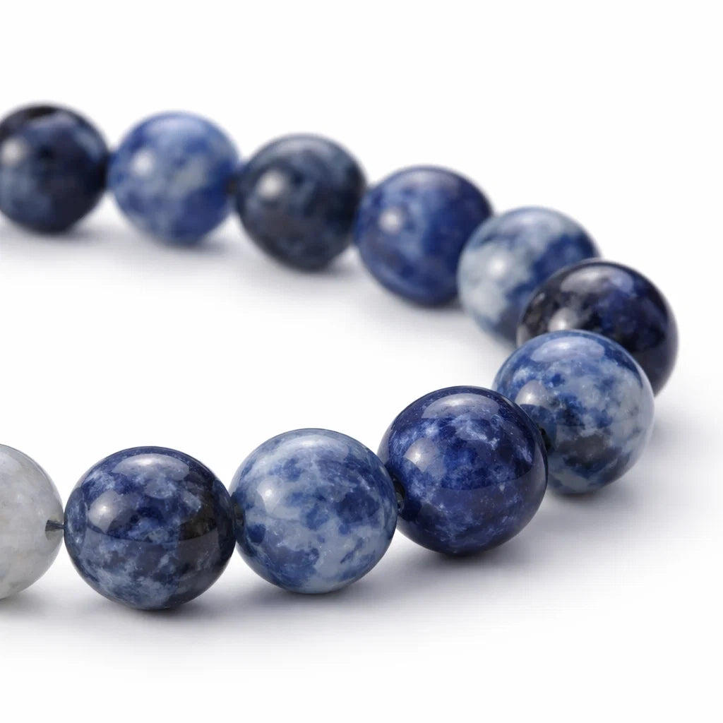 Natural sodalite crystal bracelet in a close white-background bead view