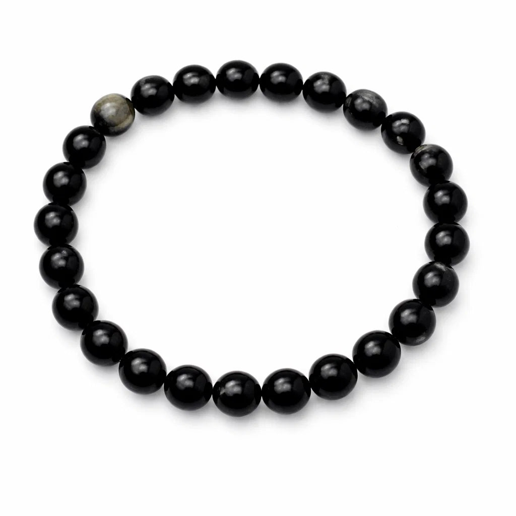 Natural sulemani hakik crystal bracelet centred in a clean product photograph