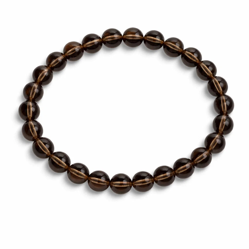 Natural smoky quartz crystal mala centred in a clean product photograph