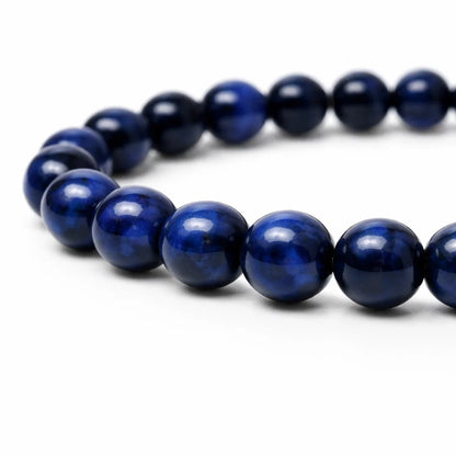 Natural blue tiger eye crystal bracelet in a close white-background bead view