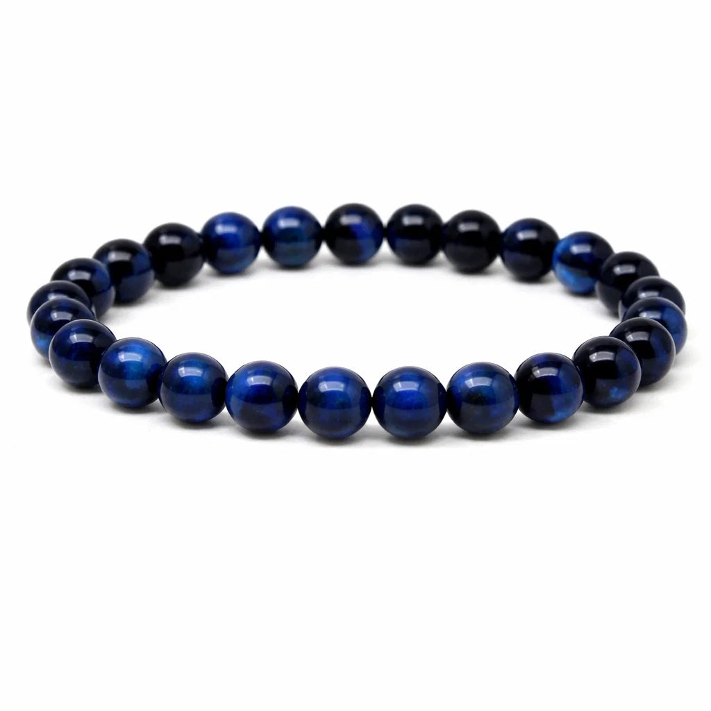 Natural blue tiger eye crystal bracelet centred in a clean product photograph