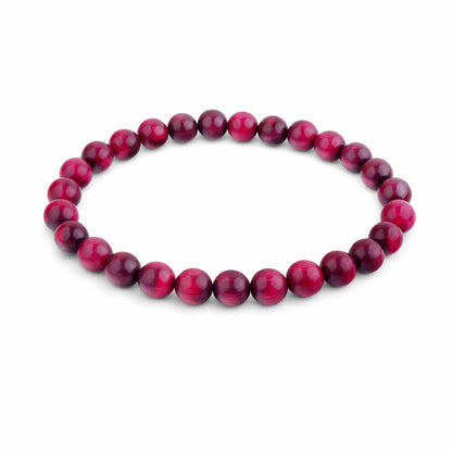 Natural pink tiger eye crystal bracelet centred in a clean product photograph