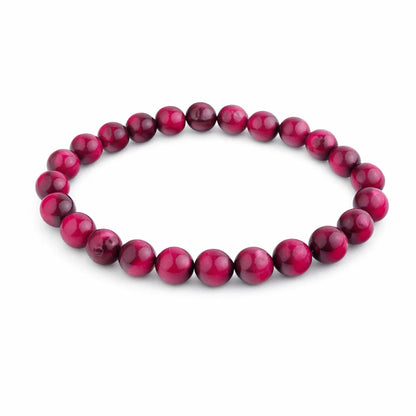 Natural pink tiger eye crystal bracelet showing the bead colour and surface on white