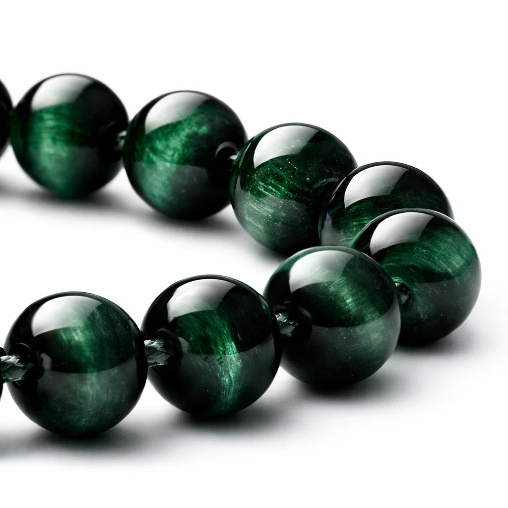 Natural green tiger eye crystal bracelet in a close white-background bead view
