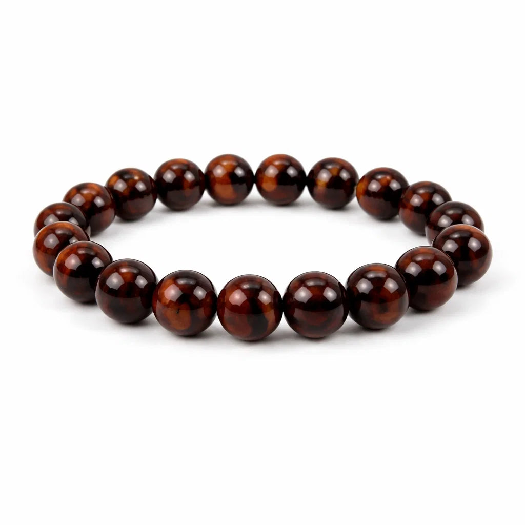 Natural red tiger eye crystal bracelet showing the bead colour and surface on white