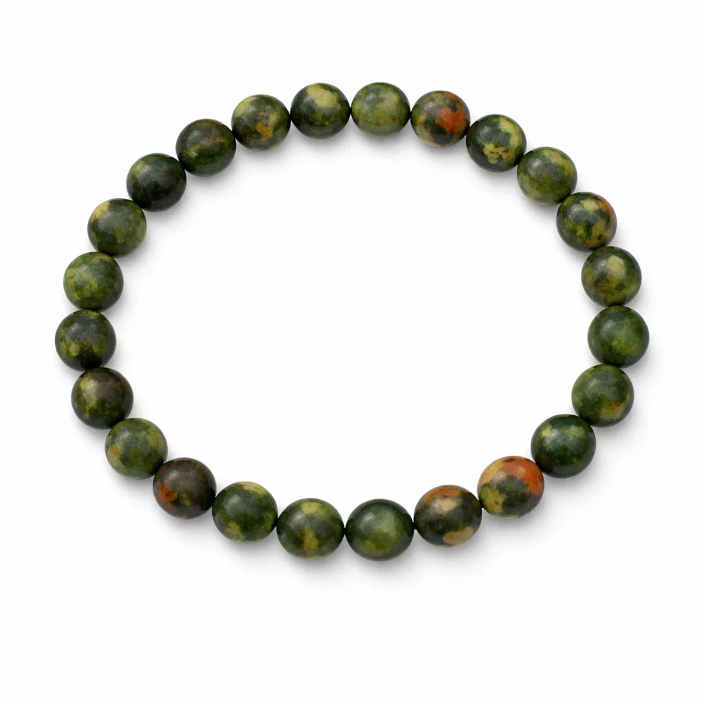 Natural unakite crystal bracelet showing the bead colour and surface on white