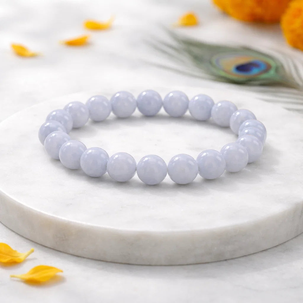 Blue lace agate crystal bracelet displayed in a softly lit product setting