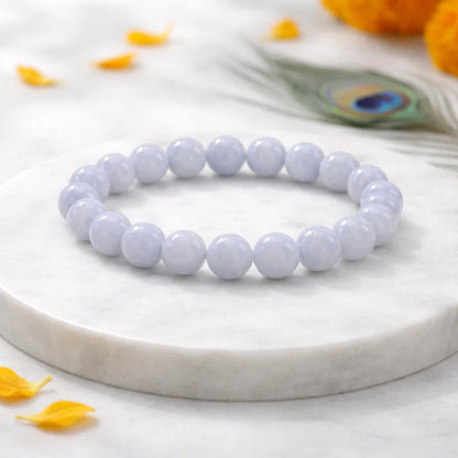 Blue lace agate crystal bracelet displayed in a softly lit product setting