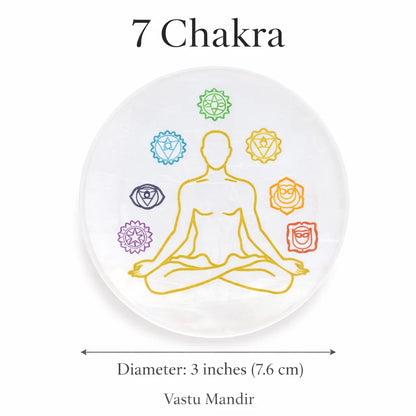 Seven chakra selenite plate displayed in a calm meditation setting