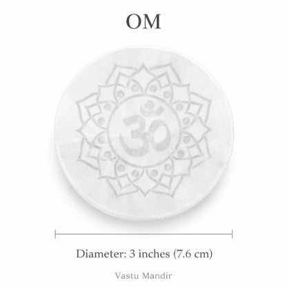 Om symbol selenite plate on a clean white background