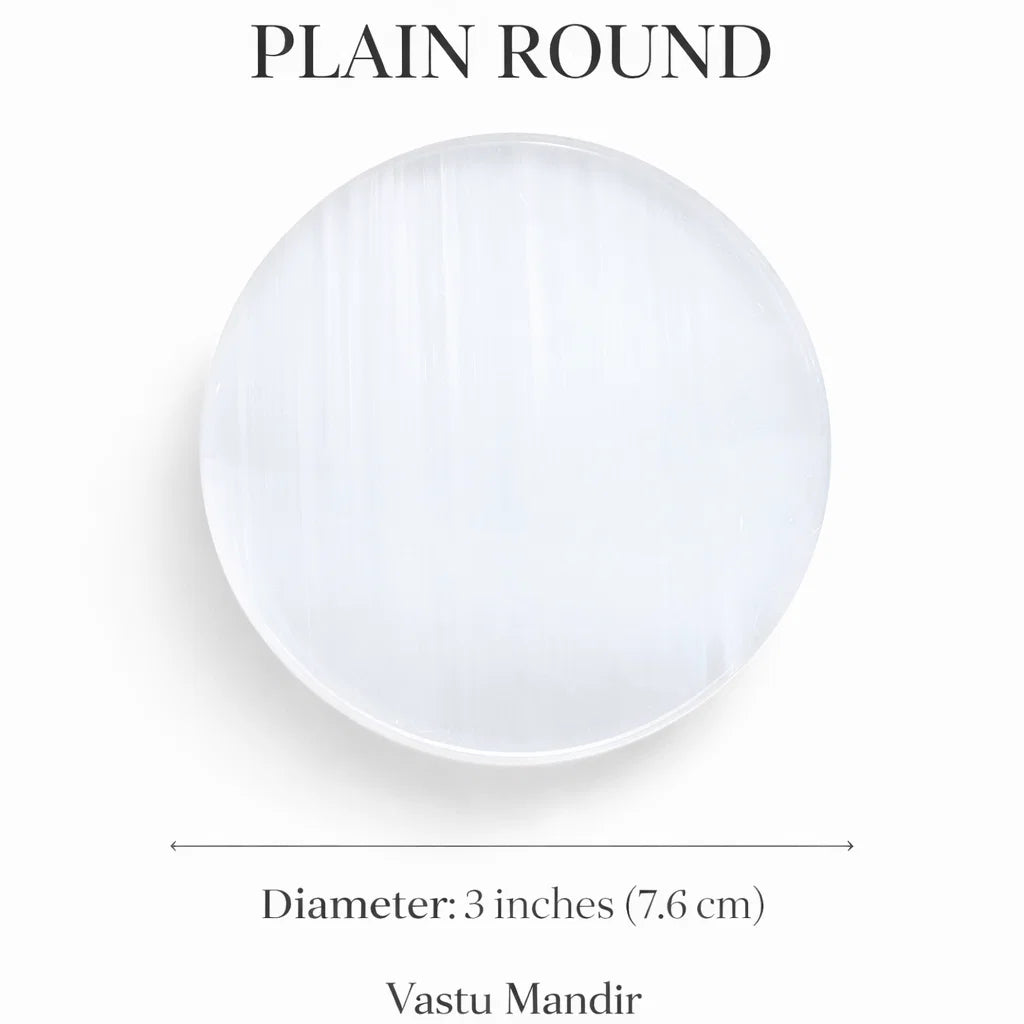 Plain round selenite plate on a clean white background