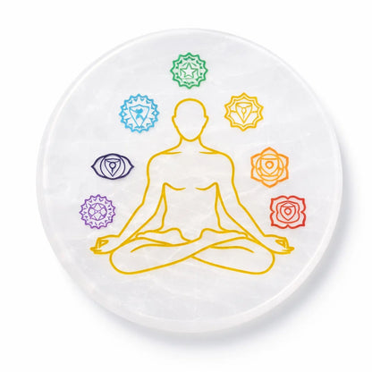Round 7 chakra selenite plate in a close-up view against a clean white background