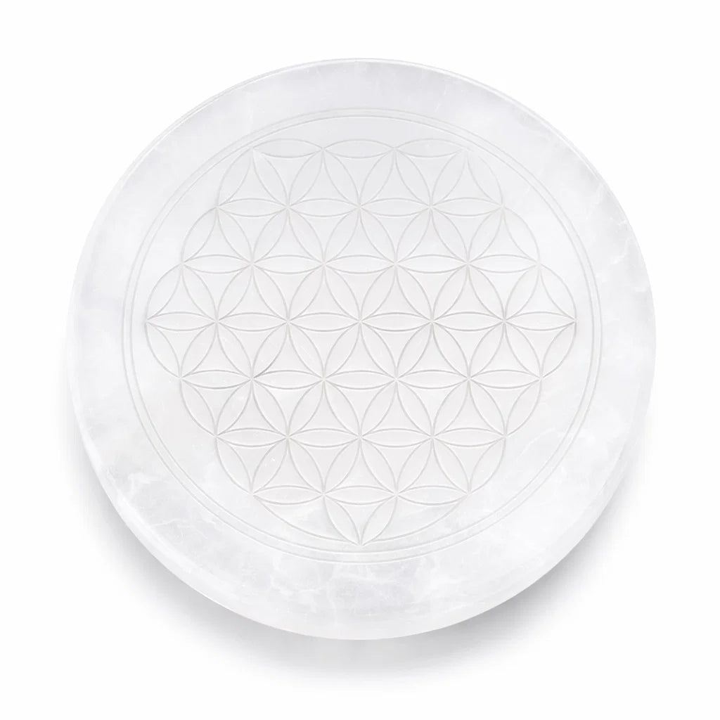 Mandala selenite plate on a clean white background