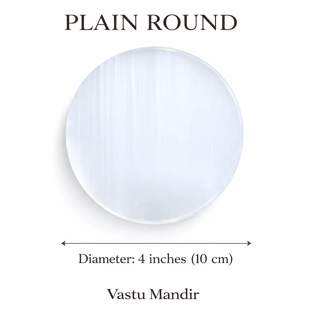 Plain round selenite plate on a clean white background