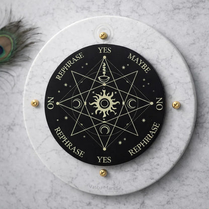 Surya Sun dowsing board displayed upright on a white marble pedestal