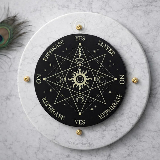 Surya Sun dowsing board displayed upright on a white marble pedestal