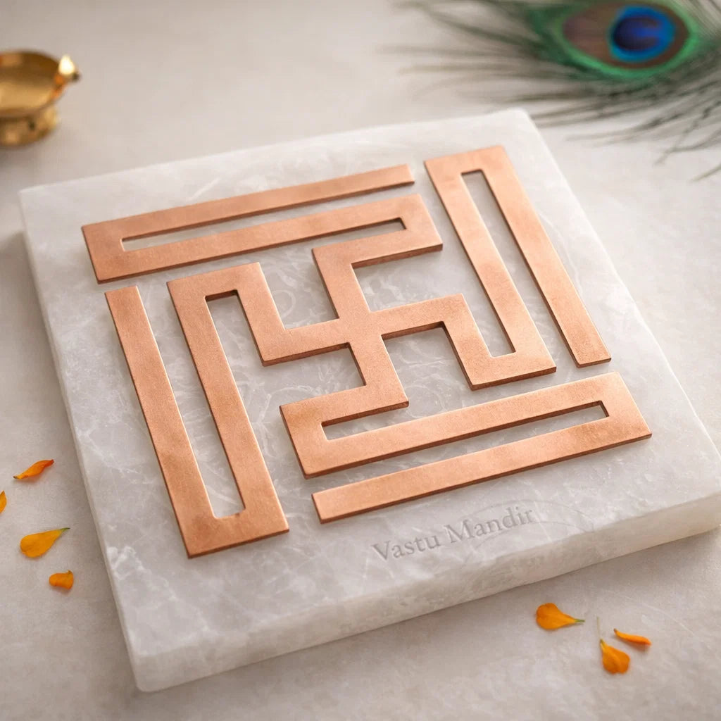 Copper nandavrat Swastik yantra displayed in a softly lit product setting